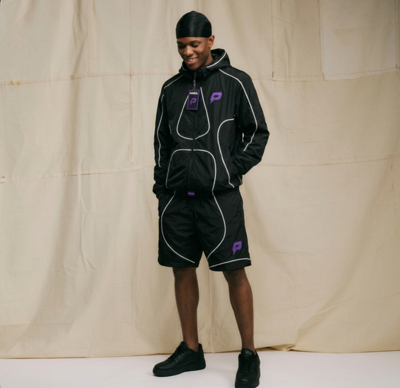 PURPL reflective tracksuit shot in studio